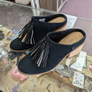 TOMS Black Suede Mules with Tassel Accents
